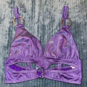 Holographic purple rave top.